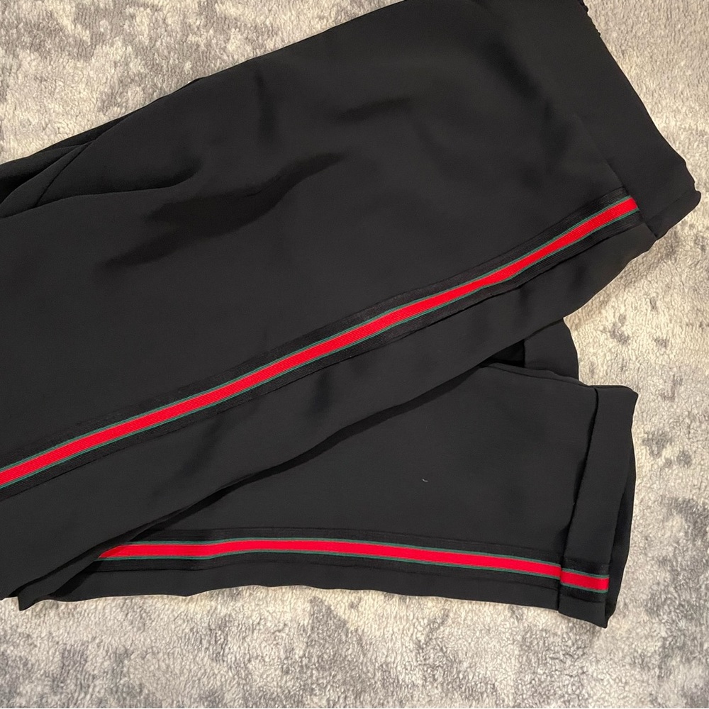 Black casual pants with green and red stripes